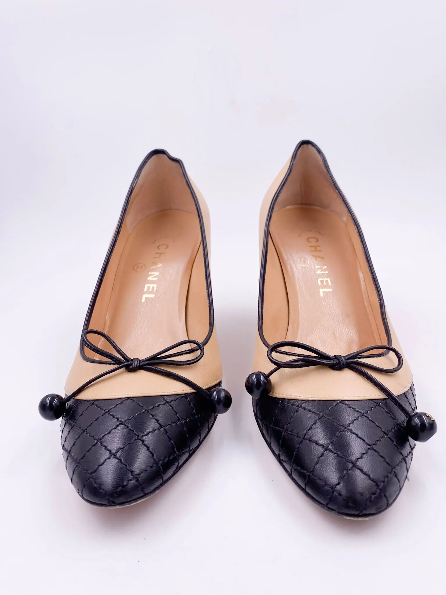 Chanel Beige Pump with Black Quilted Toe