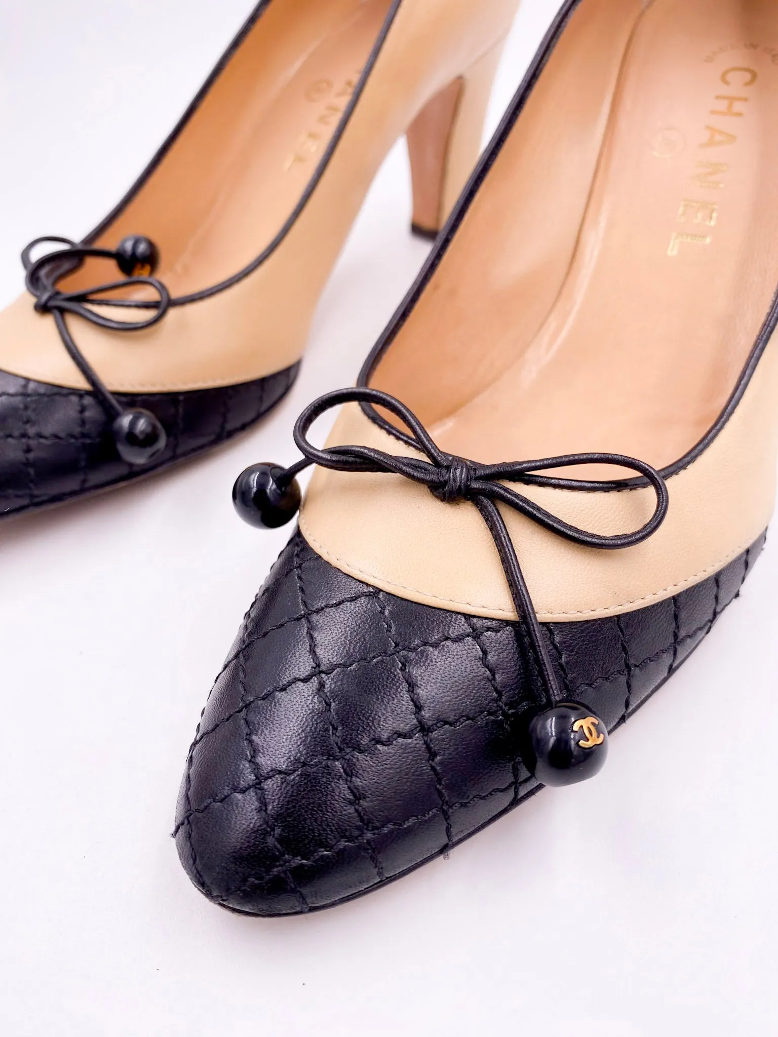 Chanel Beige Pump with Black Quilted Toe