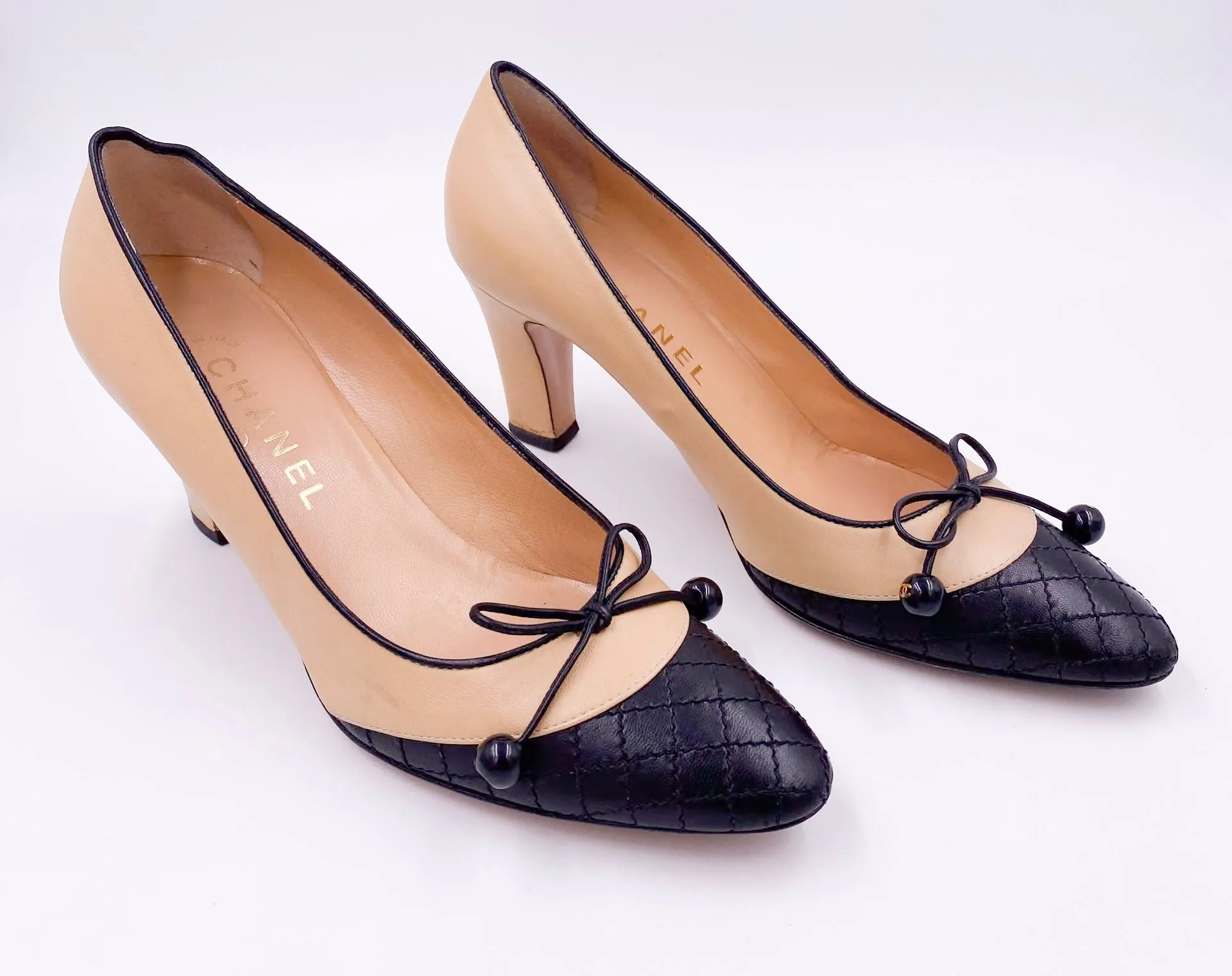 Chanel Beige Pump with Black Quilted Toe