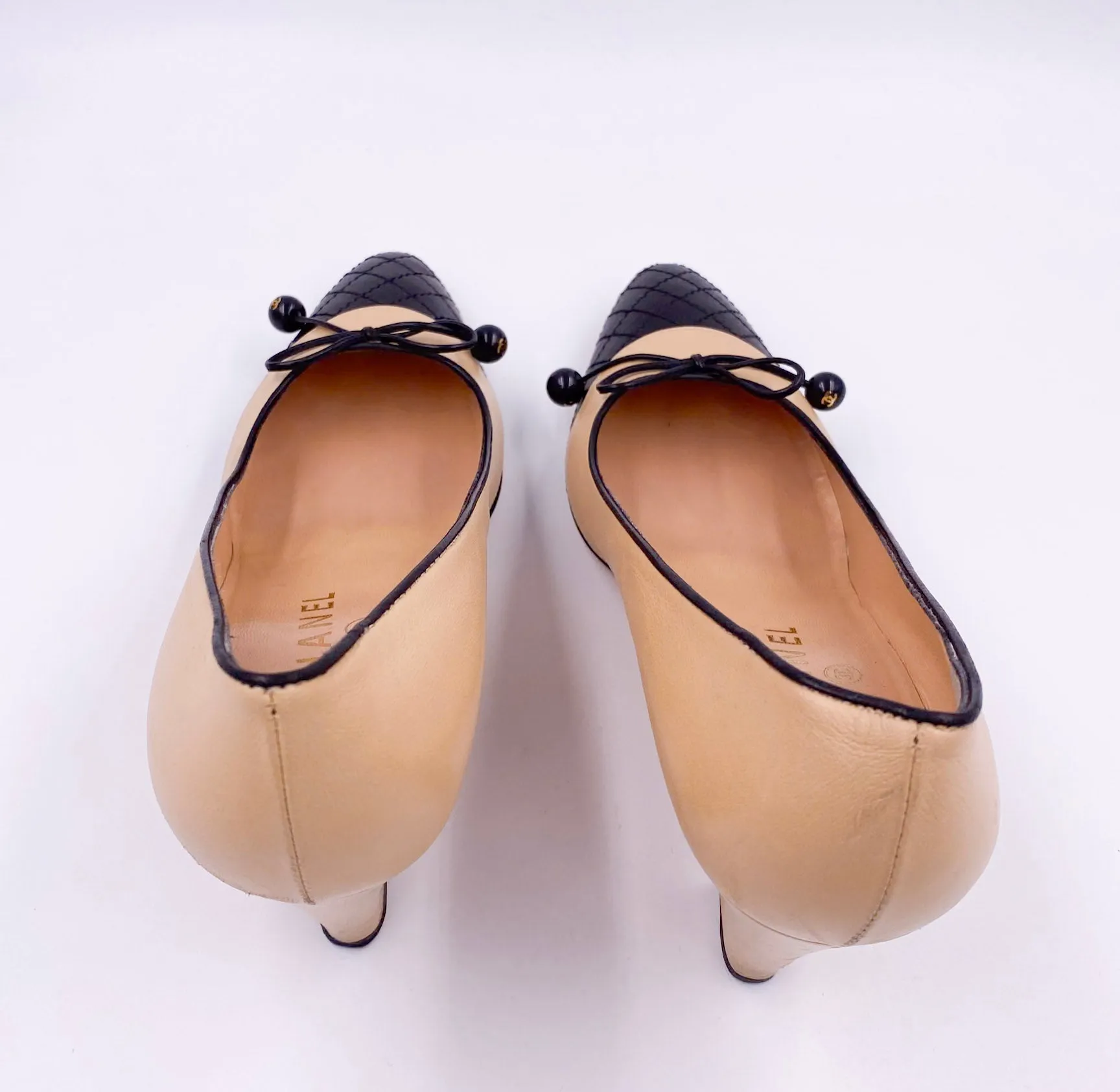 Chanel Beige Pump with Black Quilted Toe